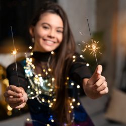 Young girl enjoying with diwali crackers